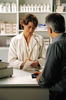 man talking to pharmacist